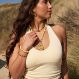 Golden shell pendant