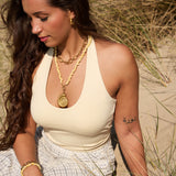 Golden shell pendant