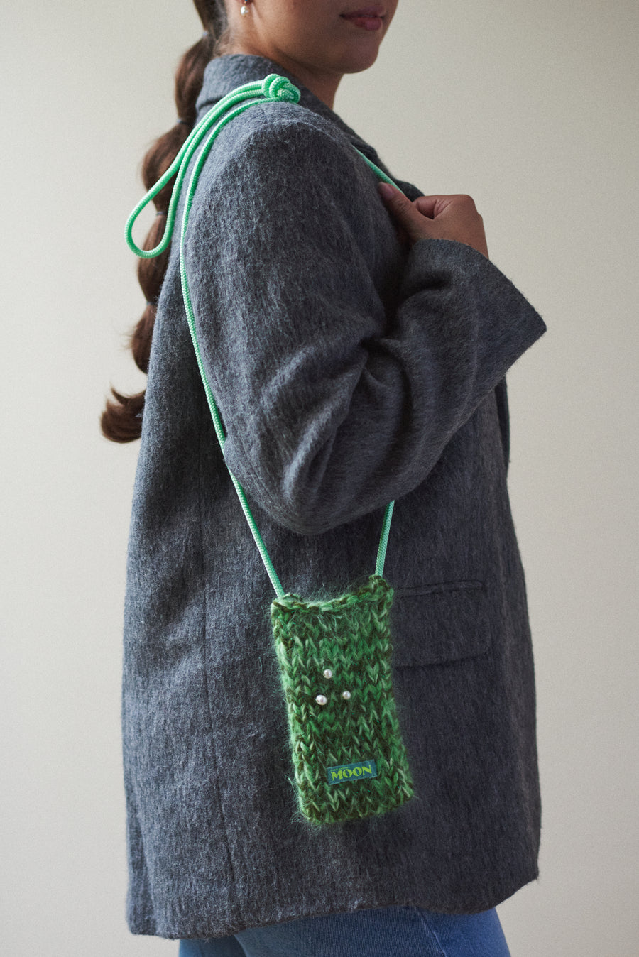 Knitted clover phone bag